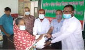 ক্ষেতলালে দু:স্থদের মাঝে খাদ্য সহায়তা প্রদান