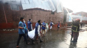 ১৫ ঘণ্টায়ও নেভেনি আগুন, বাড়ছে মরদেহের সংখ্যা

