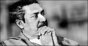বেদনার ভারে আজও নত হয় শির
