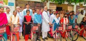 শেরপুরে আদিবাসী শিক্ষার্থীদের মাঝে অর্থ ও বাইসাইকেল বিতরণ