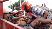 রাজশাহীতে ব্রেক ফেল করে বৈদ্যুতিক খুঁটিতে ধাক্কা, ট্রাক কেটে হেলপারকে উ’দ্ধার